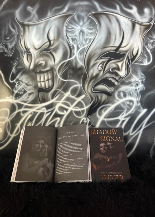 _Mockup Social Posts (500 x 700 px) (8) Print formatting and cover for Shadow Signal by Luci Fer in front of a skull painting saying Fight or Cry