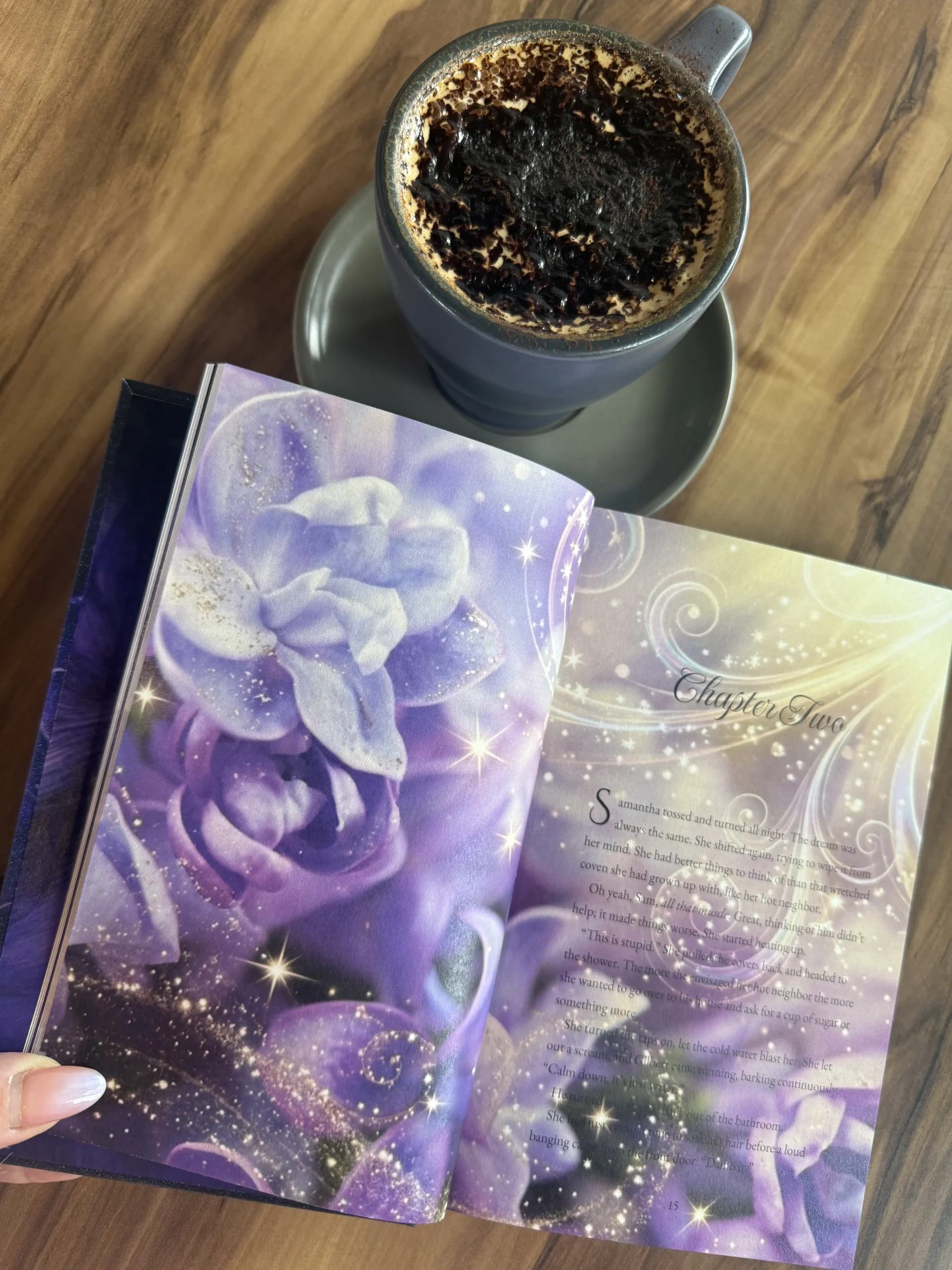 Special Edition Print Book Formatting Print book formatting example showing a professionally designed novel with full-colour chapter artwork beside a cup of coffee | Page Turner Studios